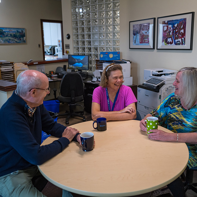 L'Arche Canada Foundation office in Richmond Hill - three people having coffee